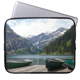 Tranquil Alpine Lake and Boats Photograph Laptop Sleeve