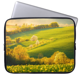 Tranquil rural landscape in sunbeams. Beautiful su Laptop Sleeve