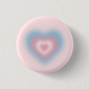 Trans flag colors on a blurred heart 3 cm round badge