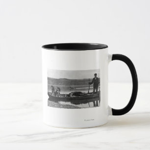 Trapper in Canoe with Hides and Dogs Alaska Mug