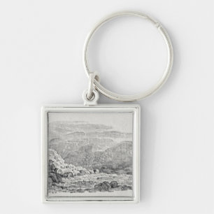 Traveller reading beneath a milestone key ring