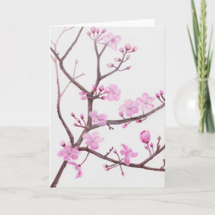Tree branch blossoming with pink flowers in spring holiday card