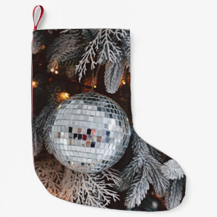 Tree decorations background with christmas light  small christmas stocking