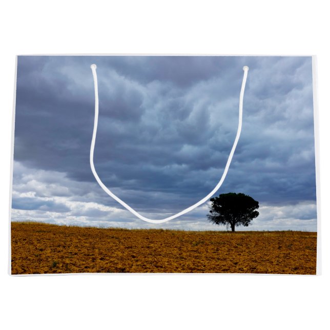 Tree in an empty field large gift bag (Front)