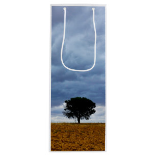 Tree in an empty field wine gift bag