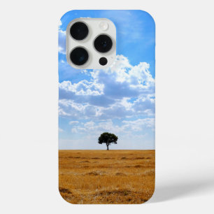 Tree in an harvested wheat field iPhone 15 pro case