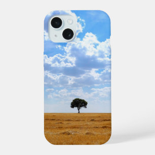 Tree in an harvested wheat field iPhone 15 case
