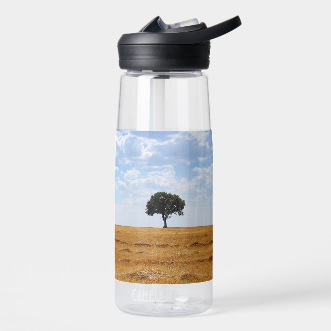 Tree in an harvested wheat field  water bottle (Left)