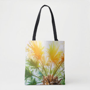 Tree palm bright sun summer background. tropical p tote bag