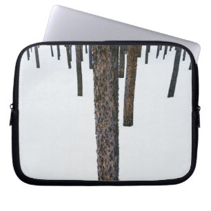 Tree Trunks in Snow Laptop Sleeve
