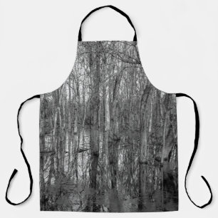 Trees in a forest in black and white. beauty in na apron