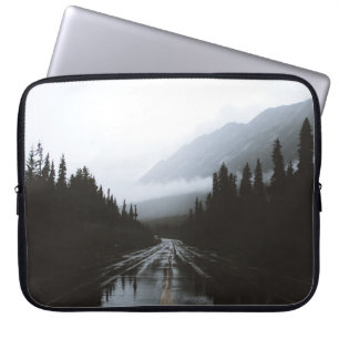 TREES NEAR ROAD LEADING TO MOUNTAIN LAPTOP SLEEVE