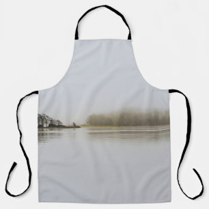 TREES SURROUNDED BY BODY OF WATER AND FOGS DURING APRON