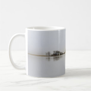 TREES SURROUNDED BY BODY OF WATER AND FOGS DURING COFFEE MUG