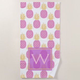 Trendy and tropical bright purple pineapples beach towel