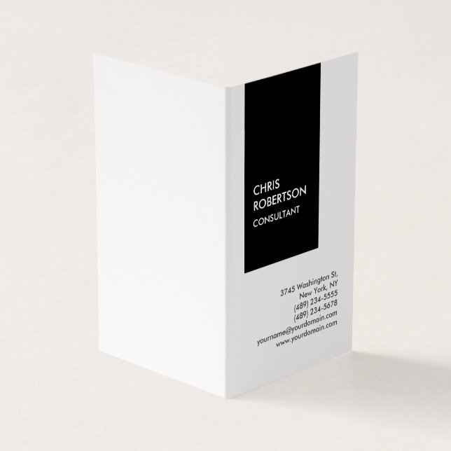 Trendy black white vertical unique business card (Outside)