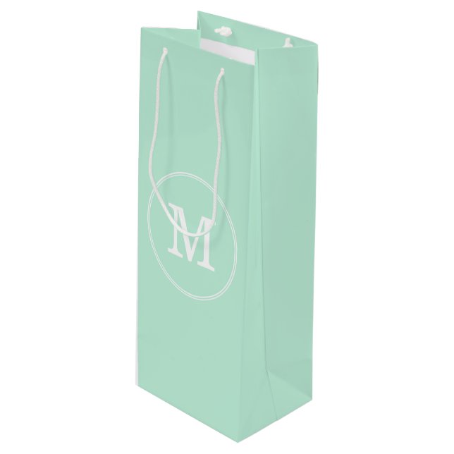 Trendy Elegant Mint Green Template White Monogram Wine Gift Bag (Front Angled)