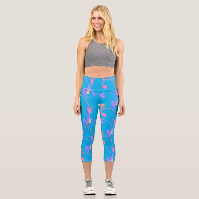 Trendy Girly Bright Blue And Pink Floral Patter Capri Leggings (Front)