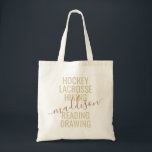 Trendy Gold Monogram Name Script Hobby Sport List Tote Bag<br><div class="desc">Personalised Custom Monogram Name Tote Bag with editable text typography and wording with a list of her hobby interests and sports played makes a fun and useful gift for the girl on the go and in lots of extracurricular activities. This example reads "hockey, lacrosse, hiking, reading, drawing" but the text...</div>