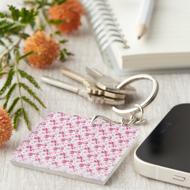 Trendy pink coquette bow pattern with cute girly key ring (Front Right)