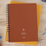 Trendy Terracotta Modern Monogram Weekly Planner<br><div class="desc">Trendy simple personal stationery 2024 annual planner featuring a modern monogram. Modern rounded sans serif typography gives an elegant casual feel. Bold modern background colour on covers. Annual planner (12 months) with open monthly overviews and weekly planning sheets. Contact for assistance in personalising.</div>