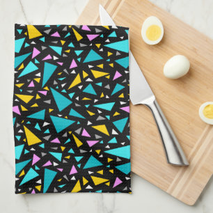 Triangles blue yellow colours on black background  tea towel