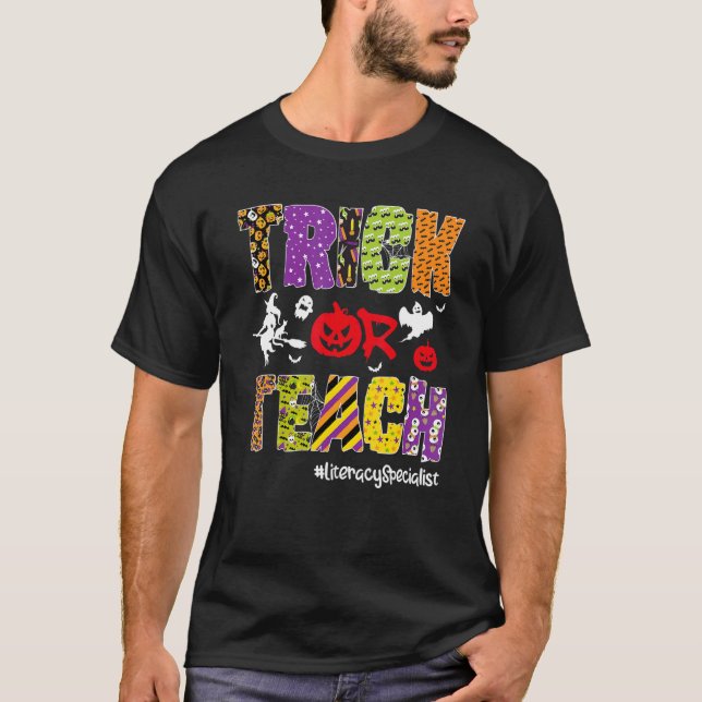 Trick Or Teach Literacy Specialist Halloween Skele T-Shirt (Front)