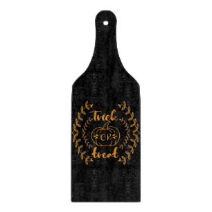 Trick or treat in plants frame cutting board