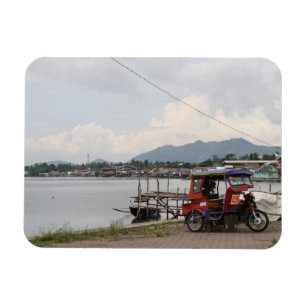 Tricycle on a quay magnet