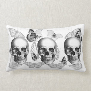 Triple Skulls and butterflies lumbar throw pillow. Cushion