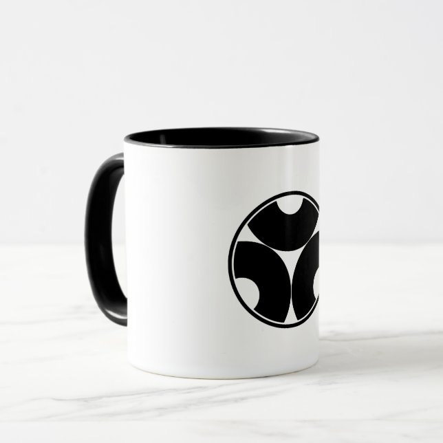 Trisected snake eyes in threadlike ring coffee mug (Front Left)