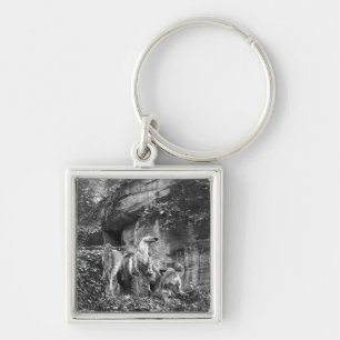 Tritons grooming two horses of the sun key ring