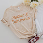 TRIXIE Retro 70's Themed Mother of the Groom T-Shirt<br><div class="desc">This mother of the groom t shirt features a retro 70's themed font with a creamy orange colouring. This shirt makes the perfect gift for the entire wedding party. Just search the Trixie Collection to find all coordinating text. 💜 COLORS ARE EDITABLE! Click 'edit design' to create your own colours....</div>
