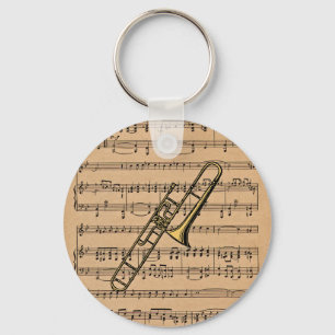 Trombone With Sheet Music Background Key Ring