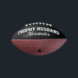 Trophy Husband mini football gift for married men<br><div class="desc">Trophy Husband mini football gift for married men. Cute personalised ball for future husband, groom to be, husband, soon to be married guy etc. Cool quote sports accessory for him. Make your own fun keepsake. Humourous present for wedding party, bachelor party, engagement, bachelorette party, birthday, honeymoon etc. Customisable in different...</div>