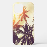 Tropical beach background with palm trees silhouet