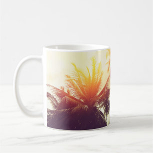 Tropical beach background with palm trees silhouet coffee mug