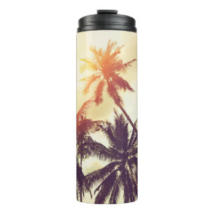 Tropical beach background with palm trees silhouet thermal tumbler
