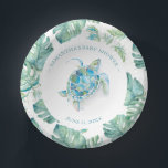 Tropical Beach Sea Turtle Baby Shower Paper Plate<br><div class="desc">Personalised paper bowls for your tropical sea turtle themed backyard baby shower. This design features a monstera palm leaves border with a watercolor sea turtle. Personalise with the mama-to-be's name and shower date in pink. To see the matching beach theme aloha party decor visit www.zazzle.com/dotellabelle Unique watercolor art and design...</div>
