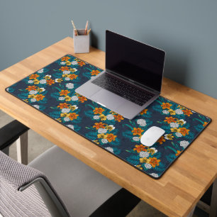 Tropical bouquet on blue desk mat
