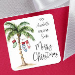 Tropical Christmas Gift Tag Sticker<br><div class="desc">Add a tropical twist to your holiday wrapping with this square Christmas gift tag featuring a playful watercolor palm tree decorated with colourful holiday stockings hanging from the fronds. Perfect for beach-themed celebrations or Christmases in places like Florida, Hawaii, or the Bahamas. The palm tree appears on the left side...</div>