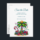 Tropical Christmas Palm Tree Announcement Postcard<br><div class="desc">Save the date postcard with a seasonal holiday image. A tropical palm tree decorated in festive lights with a star on top. A giant red and white candy cane sticking out of the sand. Christmas presents under the tree. Whimsical and fun.</div>