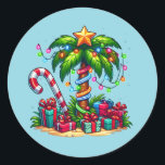 Tropical Christmas Palm Tree Classic Round Sticker<br><div class="desc">Stickers with a seasonal holiday image. A tropical palm tree decorated in festive lights with a star on top. A giant red and white candy cane sticking out of the sand. Christmas presents under the tree. Whimsical and fun.</div>