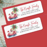 Tropical Christmas Return Address Return Address Label<br><div class="desc">Tropical Santa Christmas Return Address Label. This festive return address label features a relaxed Santa Claus lounging in a pink flamingo floaty, surrounded by tropical holiday details like a palm tree decorated with ornaments, gentle ocean waves, and a small island in the background. The charming watercolor artwork appears on the...</div>