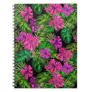 Tropical flowers and plants on black notebook