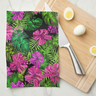 Tropical flowers and plants on black tea towel