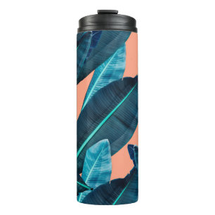 Tropical flowers, botanical seamless background. thermal tumbler