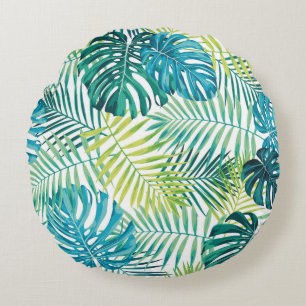 Tropical leaf design featuring green/blue palm and round cushion