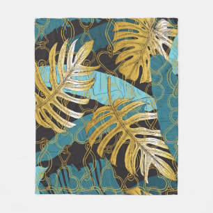 Tropical leaves under a curtain of gold chains. Se Fleece Blanket
