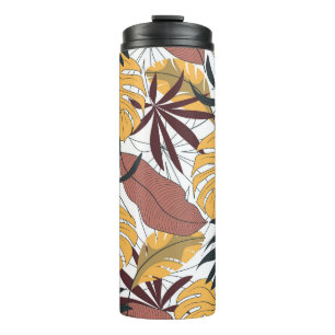 Tropical leaves: vibrant seamless background. thermal tumbler